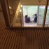 スノコの床とガラスの手摺りで吹抜けの開放感を演出する木の家なら埼玉県本庄市の小林建設